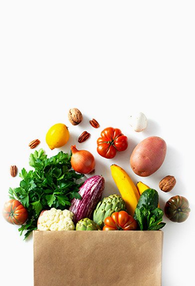 Delivery healthy food background. Healthy vegan vegetarian food in paper bag vegetables and fruits on white, copy space, banner. Shopping food supermarket and clean vegan eating concept.